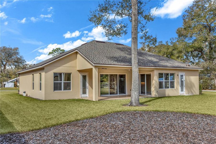 Exterior details and patio area of a home in , Orange City (Image 23).