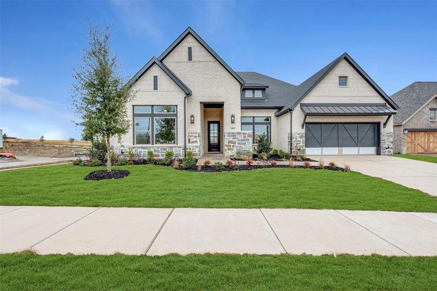 Front exterior of a new home in Terraces – Estates, Rockwall, TX, highlighting curb appeal (Image 1). Front exterior of a new home in Terraces – Estates, Rockwall, TX, highlighting curb appeal (Image 1).