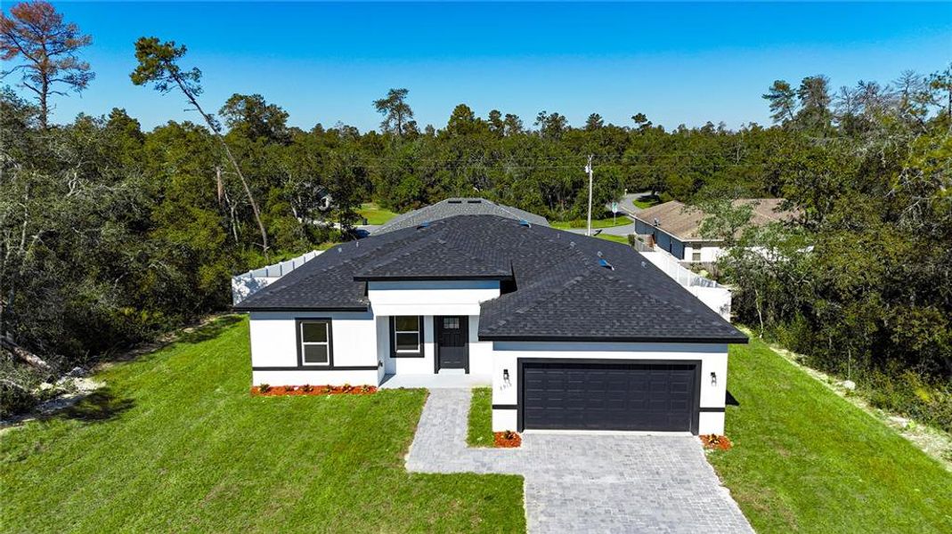 Front exterior of a new home in , Ocala, FL, highlighting curb appeal (Image 21). Front exterior of a new home in , Ocala, FL, highlighting curb appeal (Image 21).