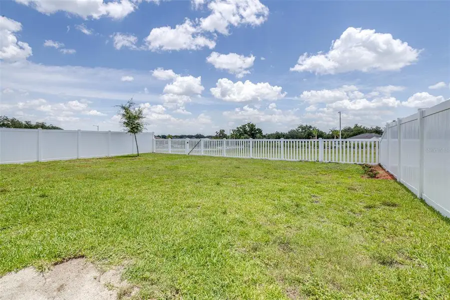 Exterior details and patio area of a home in Wind Meadows South, Bartow (Image 4). Exterior details and patio area of a home in Wind Meadows South, Bartow (Image 4).