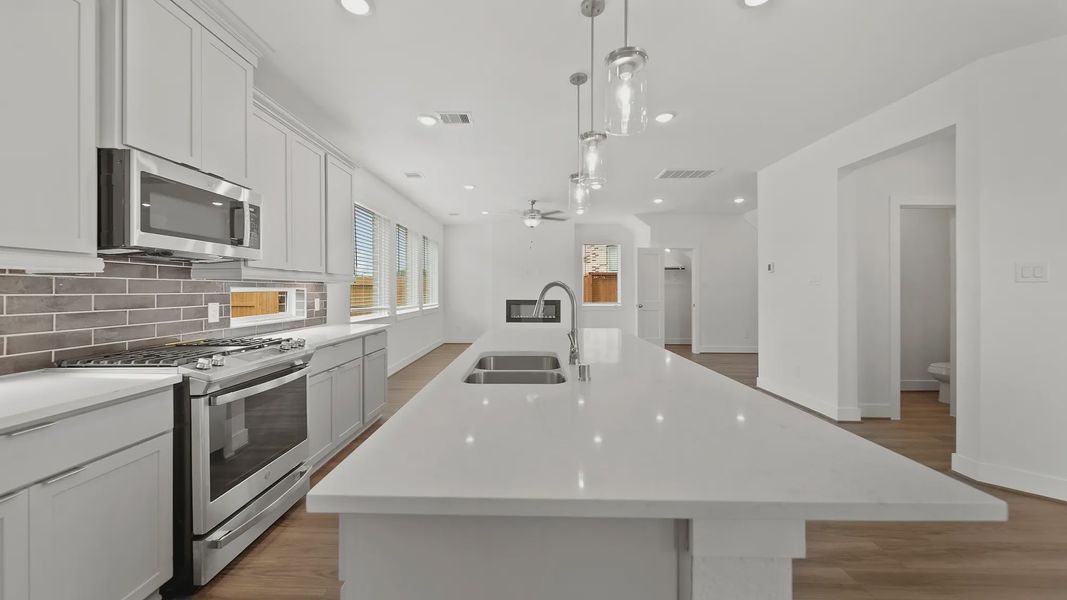 Representative furnished interior of a home built from the Rosewood by Chesmar Homes in Sienna Courtyard, Missouri City (Image 4).