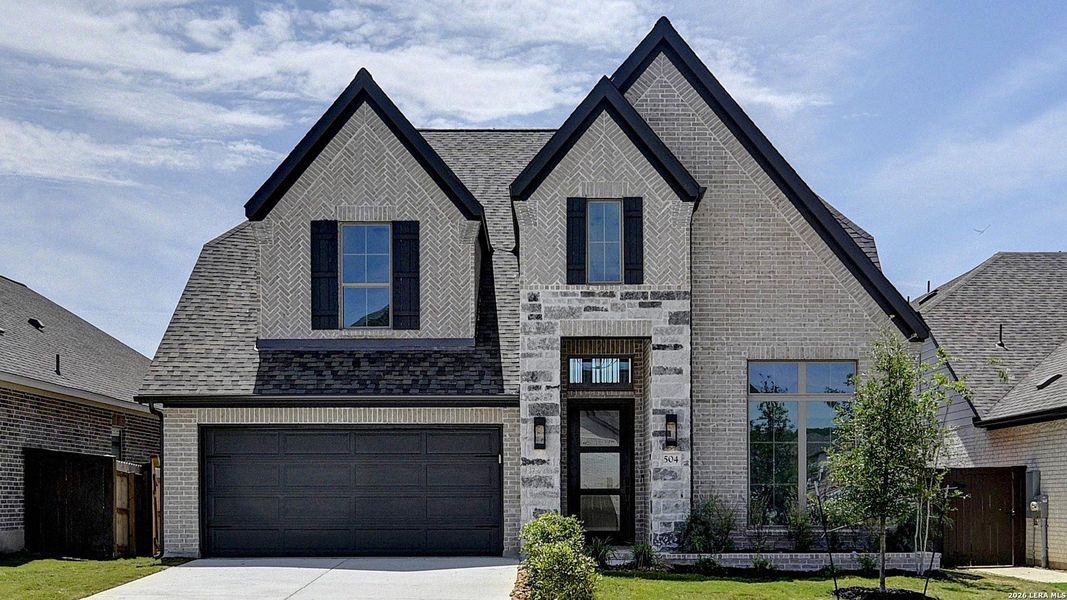 Front exterior of a new home in Corley Farms, Boerne, TX, highlighting curb appeal (Image 2).