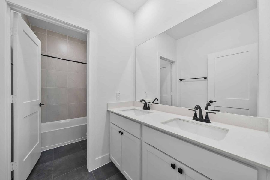 Furnished interior view inside a new home in Meridiana, Manvel (Image 9).