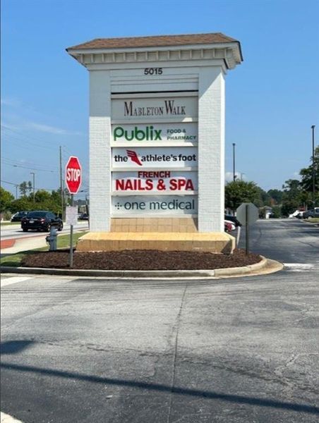 Front exterior of a new home in Wilkins Walk, Mableton, GA, highlighting curb appeal (Image 1). Front exterior of a new home in Wilkins Walk, Mableton, GA, highlighting curb appeal (Image 1).