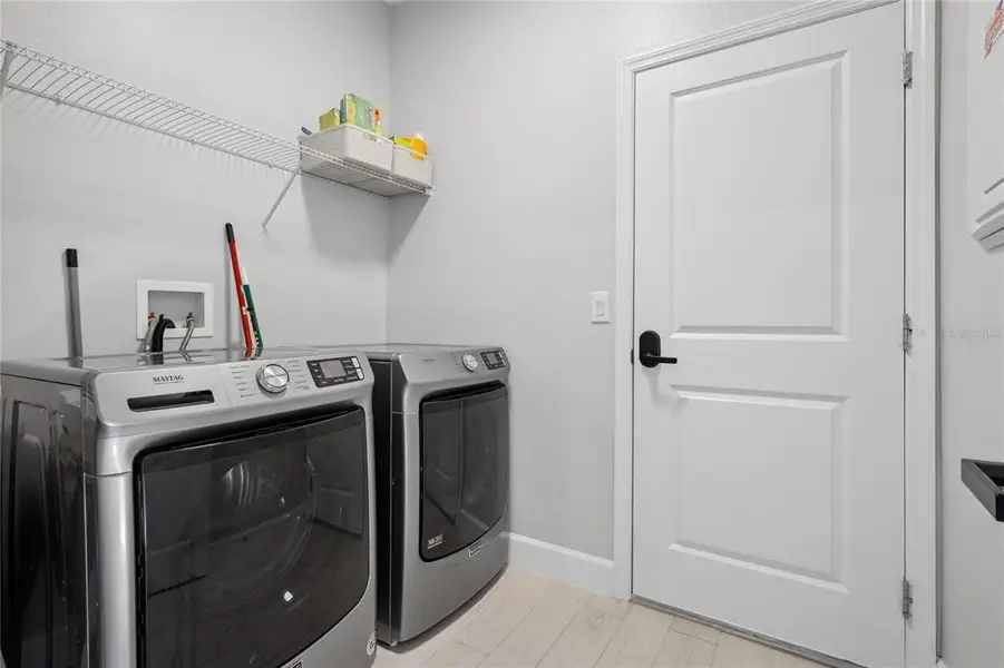 Furnished interior view inside a new home in Emerson Pointe, Apopka (Image 26). Furnished interior view inside a new home in Emerson Pointe, Apopka (Image 26).