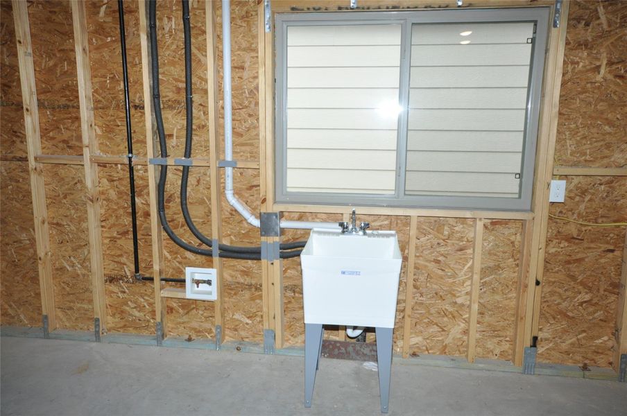 Plumbing is included for future kitchen sink and washer and dryer connections