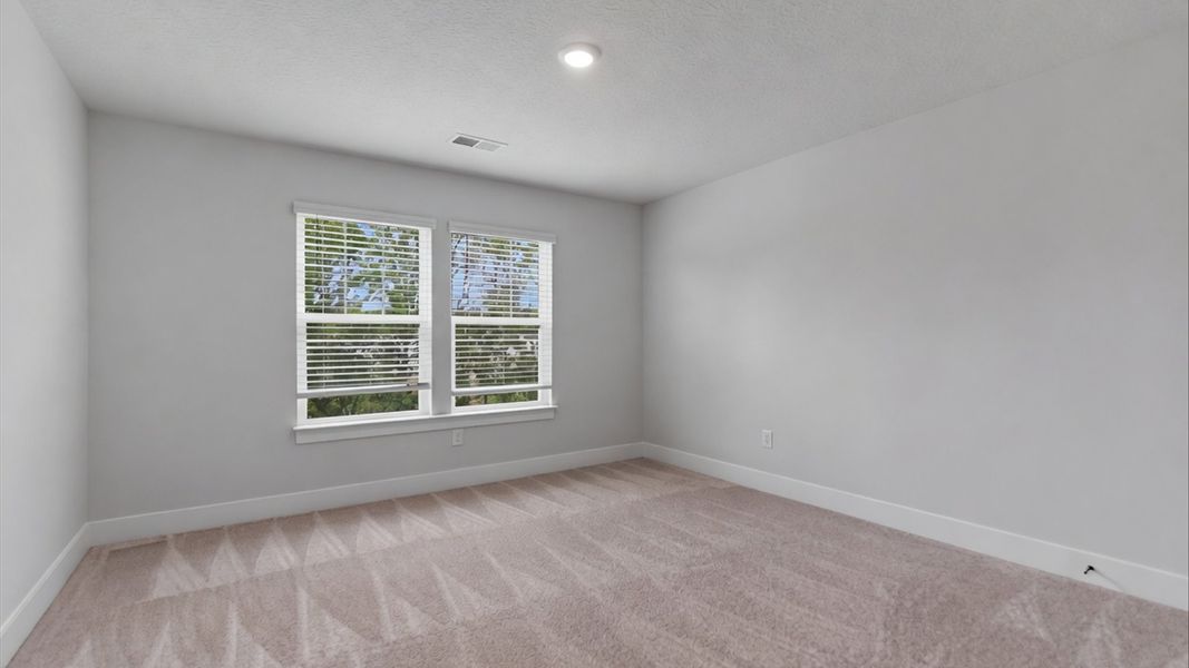 Furnished interior view inside a new home in Village at Midway, Anderson (Image 27).