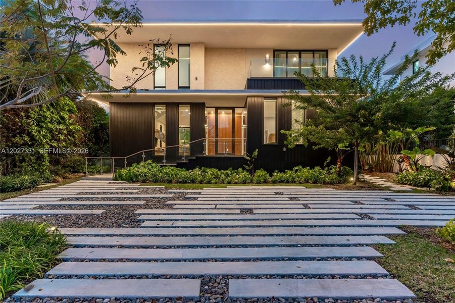 Front exterior of a new home in , Miami Beach, FL, highlighting curb appeal (Image 1). Front exterior of a new home in , Miami Beach, FL, highlighting curb appeal (Image 1).