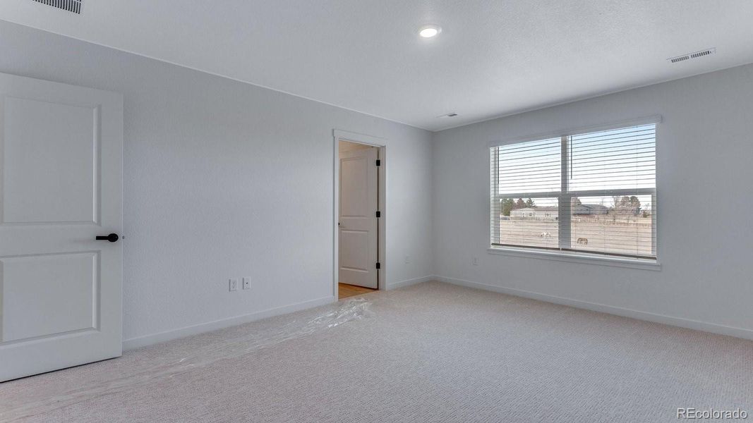 Spacious, unfurnished interior of a new home in Trails at Crowfoot, Parker (Image 22).