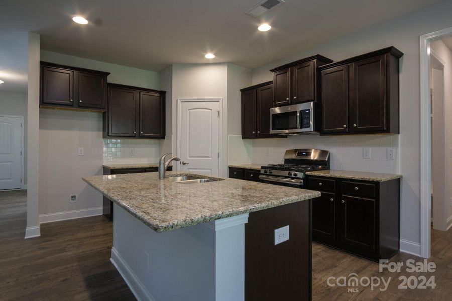 Kitchen. Photo representation. Colors and options will differ.