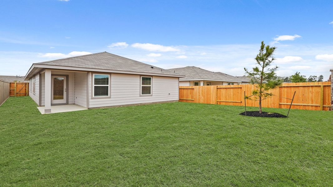 Exterior details and patio area of a home in Presswoods, Splendora (Image 4).