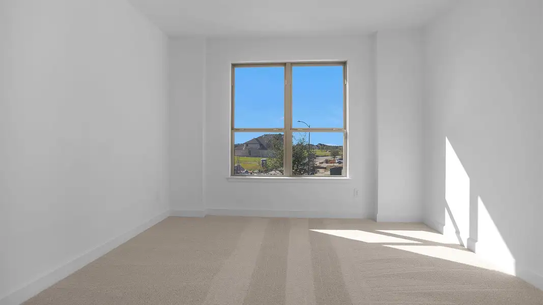 Spacious, unfurnished interior of a new home in Elyson 65', Katy (Image 4). Spacious, unfurnished interior of a new home in Elyson 65', Katy (Image 4).