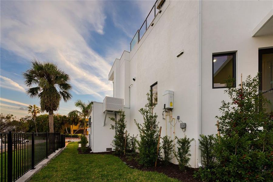 Exterior details and patio area of a home in , Longboat Key (Image 53).