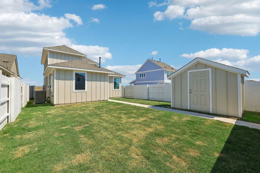 Exterior details and patio area of a home in Harvest Ridge, Elgin (Image 15).