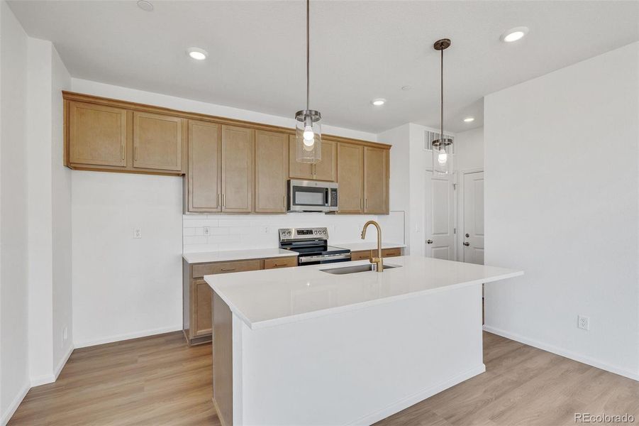 Furnished interior view inside a new home in Turnberry, Commerce City (Image 18).