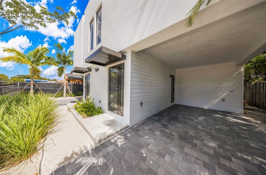 Front exterior of a new home in , Miami, FL, highlighting curb appeal (Image 13).
