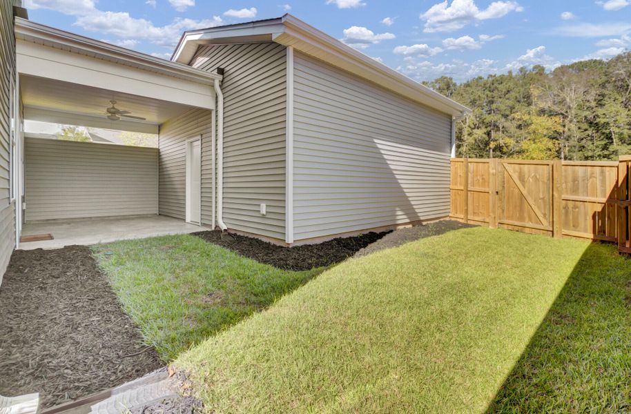 Exterior details and patio area of a home in Six Oaks, Summerville (Image 32).