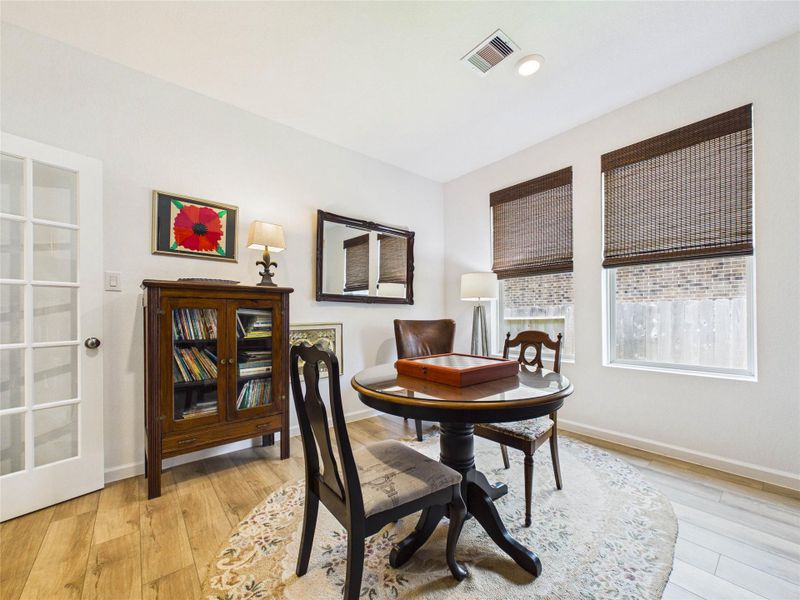 Office/Bonus space with glass french doors and double windows