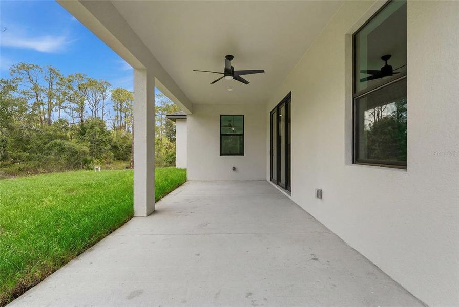 Exterior details and patio area of a home in , Port Charlotte (Image 24).