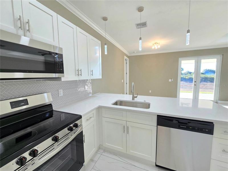 Furnished interior view inside a new home in , Lehigh Acres (Image 8). Furnished interior view inside a new home in , Lehigh Acres (Image 8).