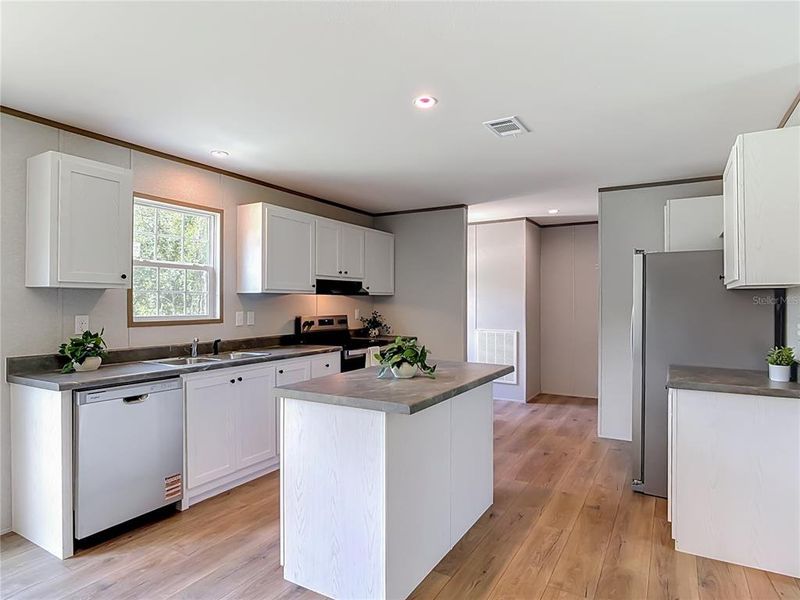Furnished interior view inside a new home in , Deland (Image 12).