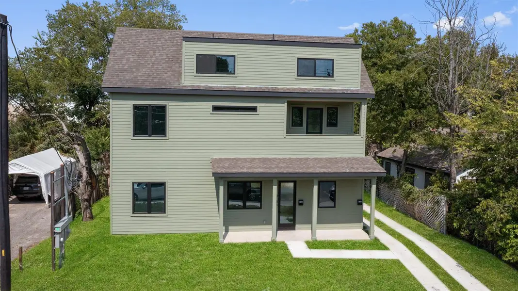 Front exterior of a new home in , Austin, TX, highlighting curb appeal (Image 2).