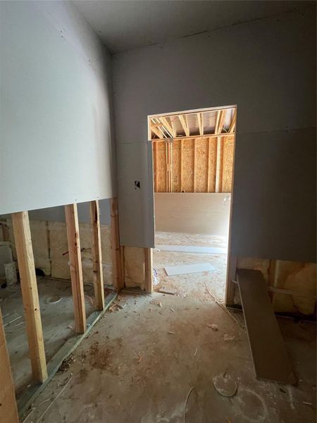 Oversized laundry room conveniently located near the garage