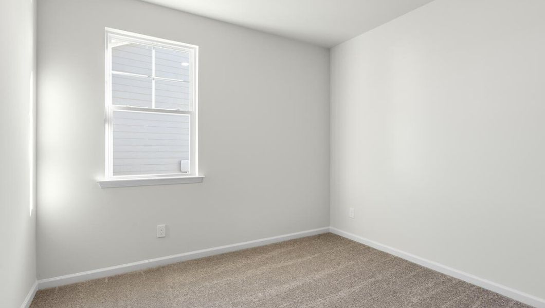 Representative unfurnished interior of a home built from the KERRY by D.R. Horton in Cedar Hill Landing, Navassa (Image 24).