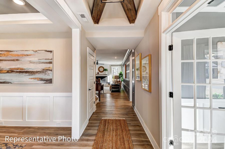 Entry way - both dining room and office included in this home