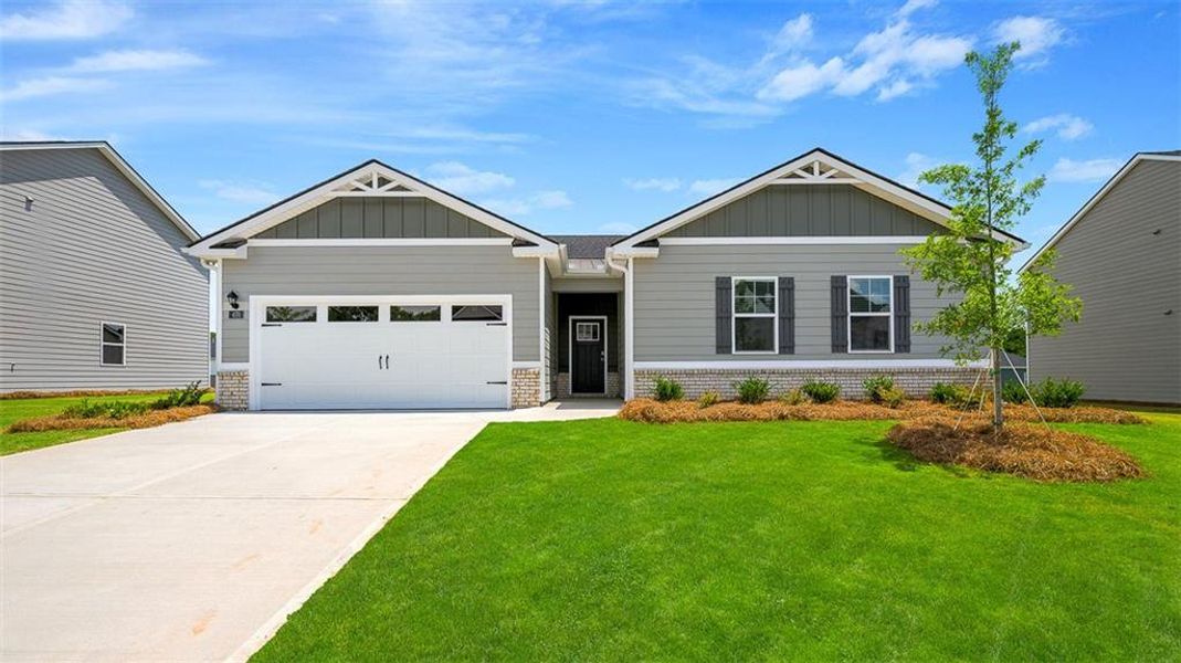 Front exterior of a new home in Jackson Landing, Jefferson, GA, highlighting curb appeal (Image 1). Front exterior of a new home in Jackson Landing, Jefferson, GA, highlighting curb appeal (Image 1).