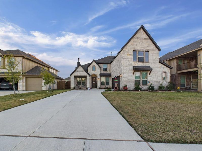 Front exterior of a new home in , Ponder, TX, highlighting curb appeal (Image 24).