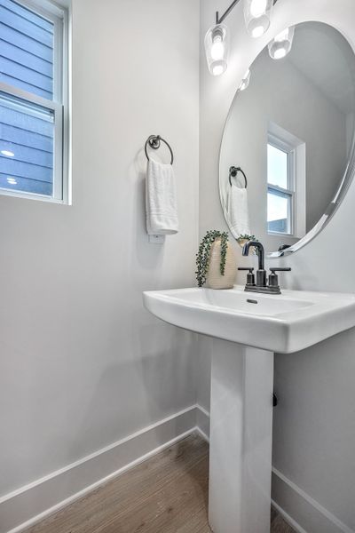 Stylish 2nd Floor Powder Room in The Ingram Townhome