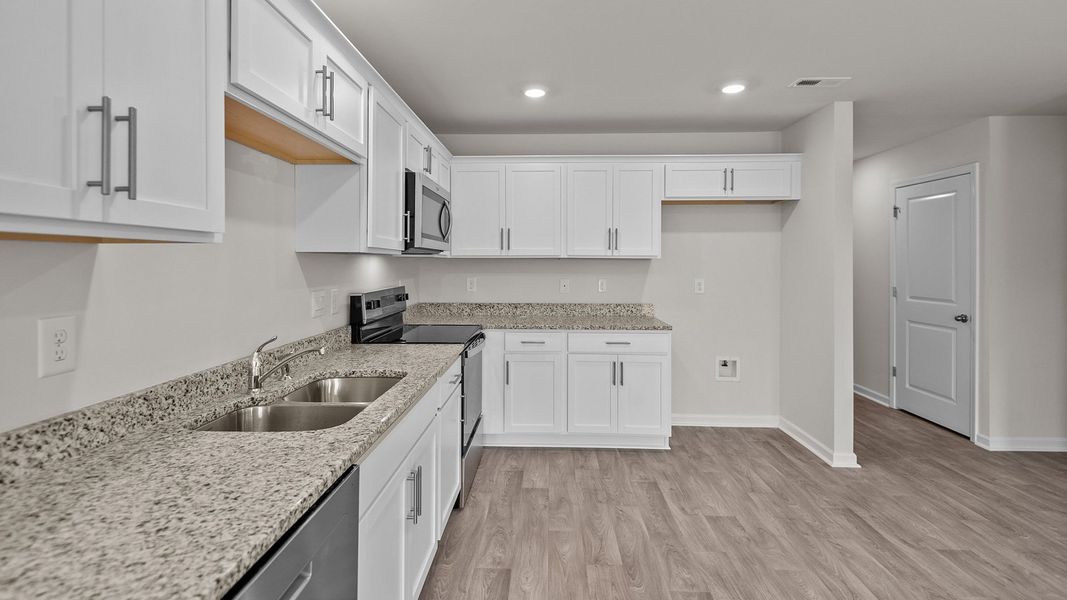 Furnished interior view inside a new home in Hobbs Farm, Ayden (Image 6).