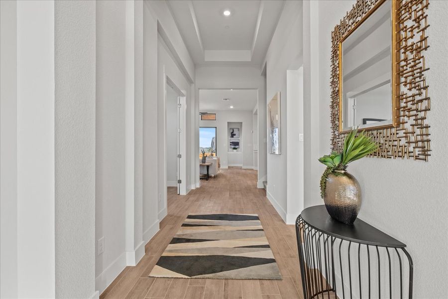 Representative furnished interior of a home built from the Bradley by Chesmar Homes in Sweetwater, Austin (Image 3).