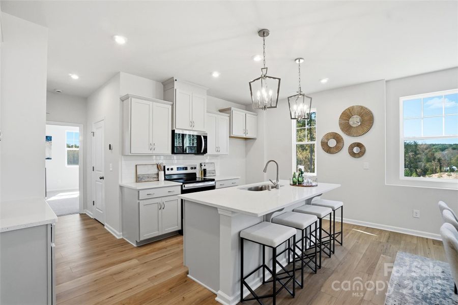 Representational only. Actual exterior elevation and interior finishes can vary.