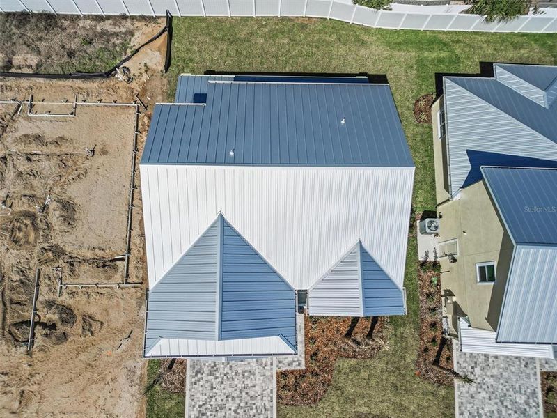 Exterior details and patio area of a home in Beachview Cove, Ormond Beach (Image 2).