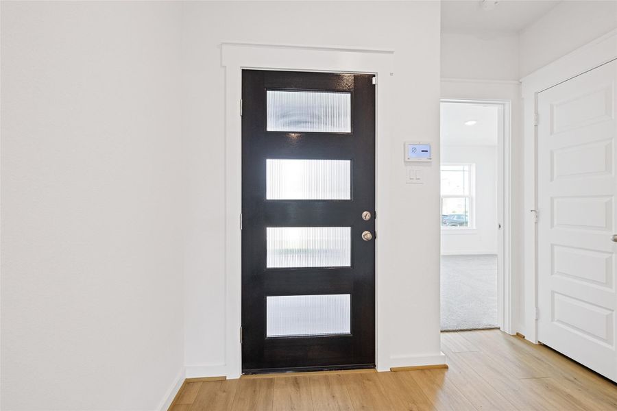 Spacious, unfurnished interior of a new home in Sunterra, Katy (Image 24).