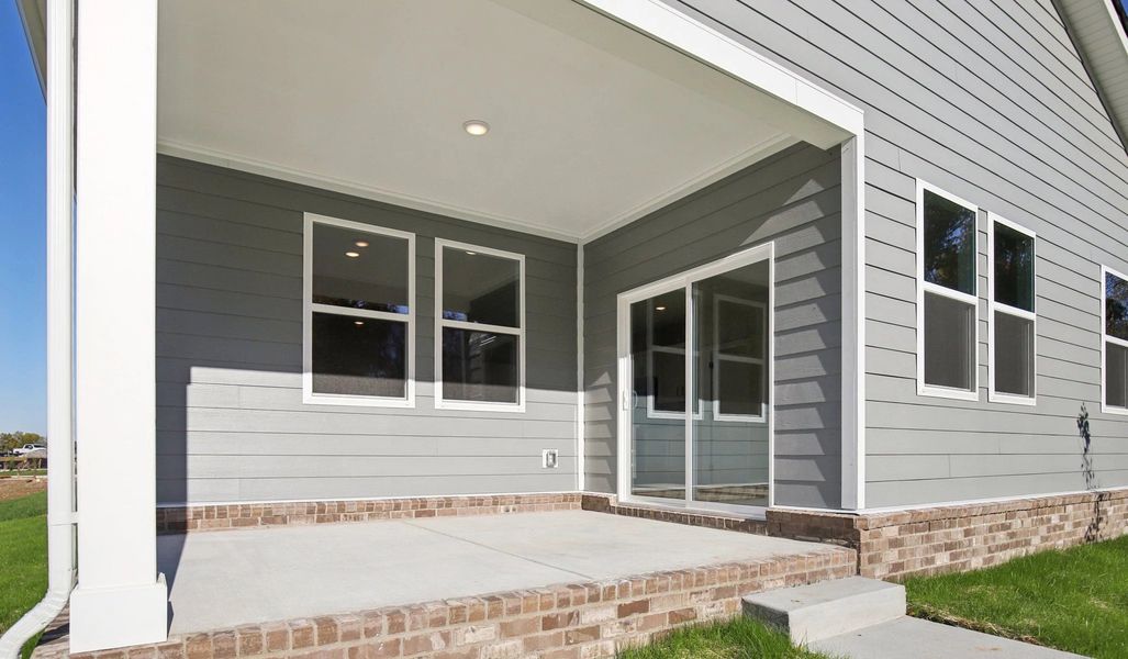 Exterior details and patio area of a home in Cedars at Cane Ridge | 55+ Community, Antioch (Image 26). Exterior details and patio area of a home in Cedars at Cane Ridge | 55+ Community, Antioch (Image 26).