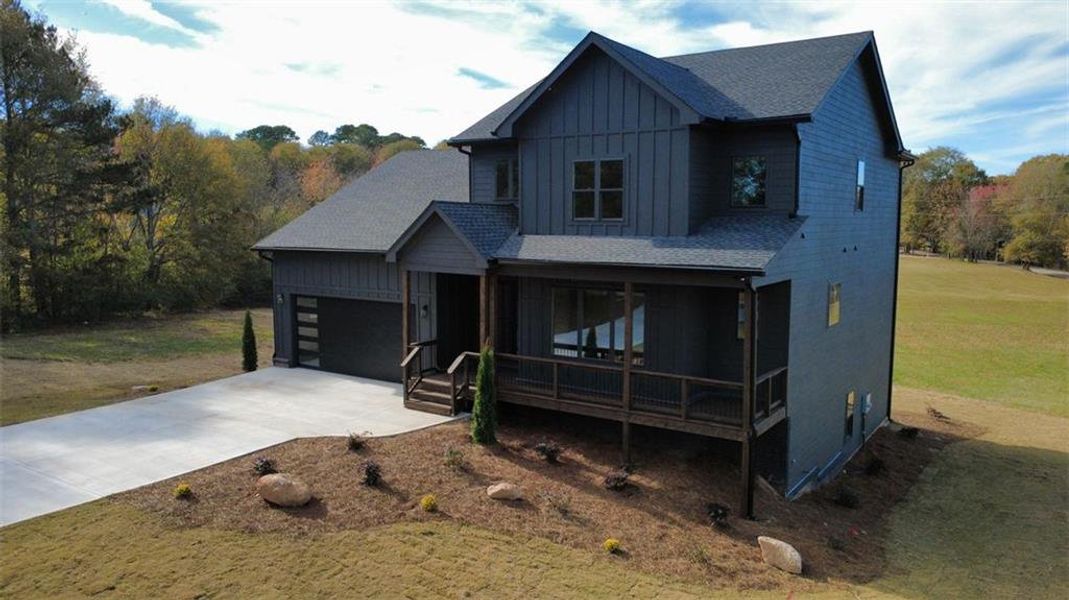 Front exterior of a new home in , Snellville, GA, highlighting curb appeal (Image 2).