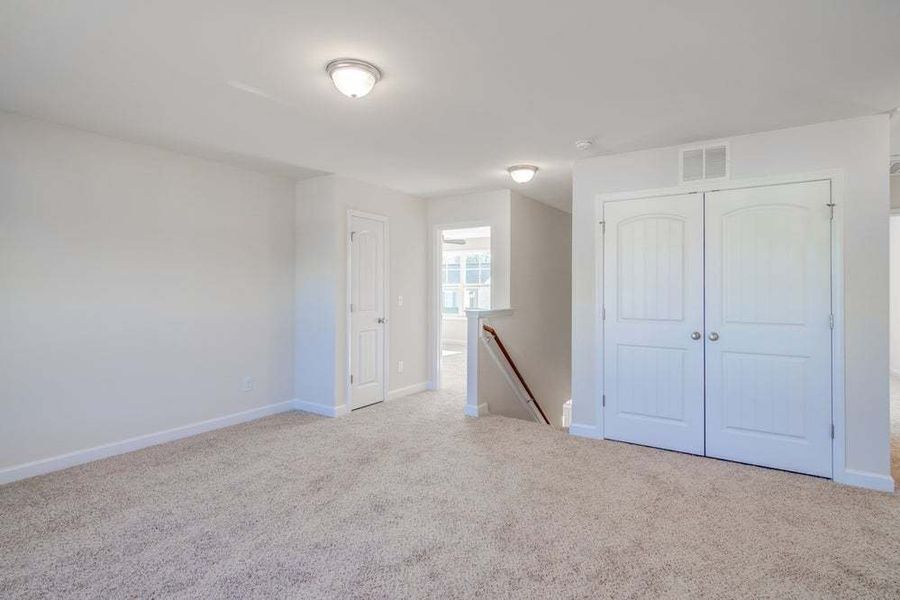 Representative unfurnished interior of a home built from the Drayton by Caviness & Cates Communities in Bartlett Manor, Youngsville (Image 87).