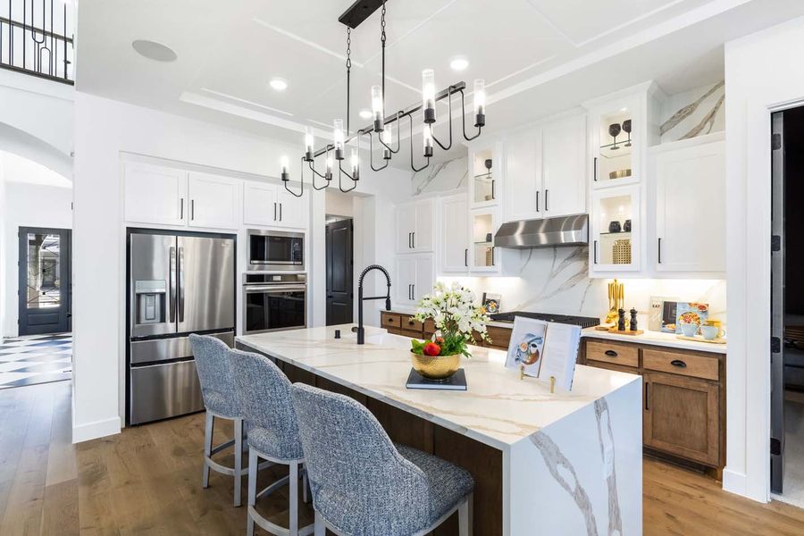 Representative furnished interior of a home built from the 223G by Highland Homes in Santa Rita Ranch, Liberty Hill (Image 6). Representative furnished interior of a home built from the 223G by Highland Homes in Santa Rita Ranch, Liberty Hill (Image 6).