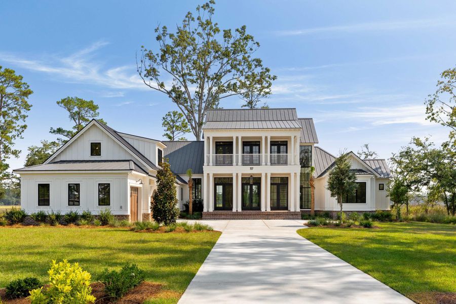 Front exterior of a new home in , Ravenel, SC, highlighting curb appeal (Image 30).