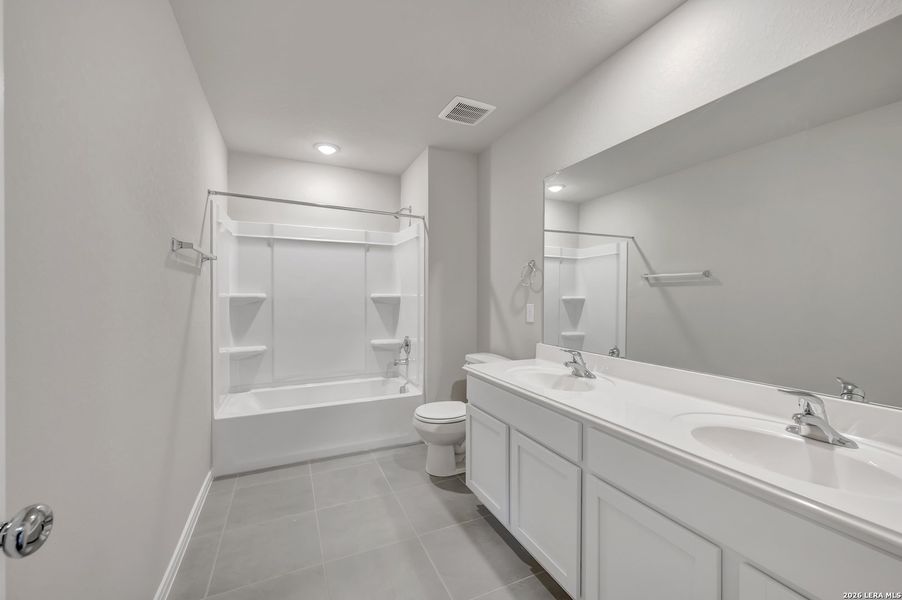 Furnished interior view inside a new home in Hunters Ranch, San Antonio (Image 8).