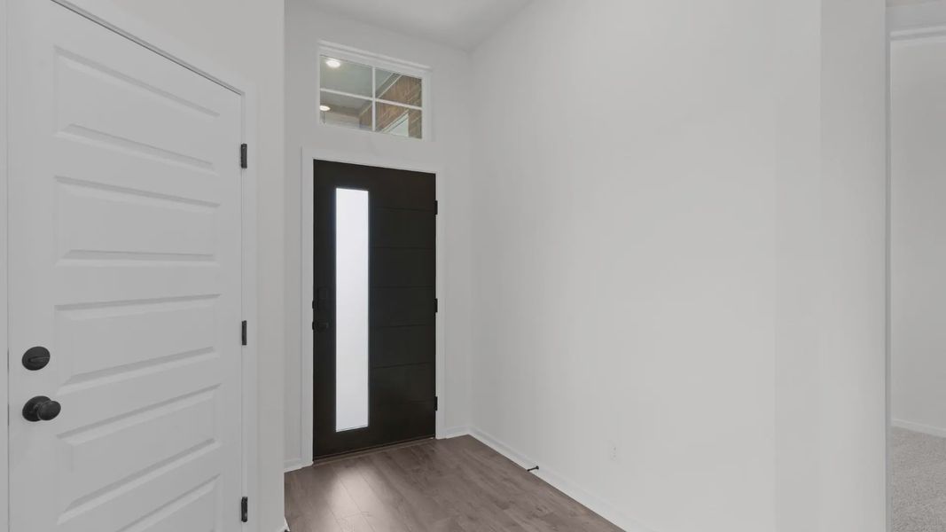 Representative unfurnished interior of a home built from the Aventura by Chesmar Homes in Parkside on the River, Georgetown (Image 10).