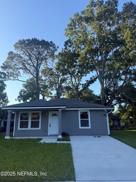 Front exterior of a new home in , Jacksonville, FL, highlighting curb appeal (Image 2).