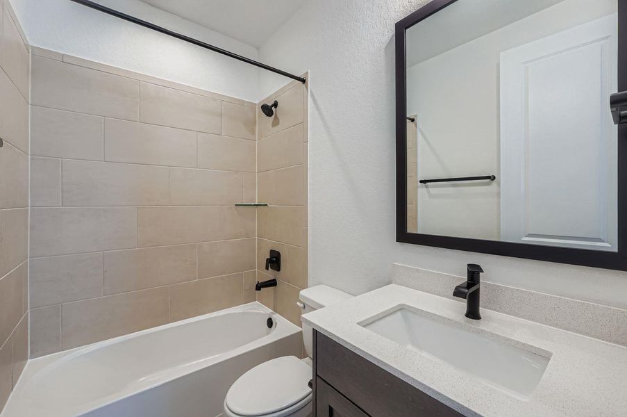 Furnished interior view inside a new home in The Porch at Du Pre, Buda (Image 8).