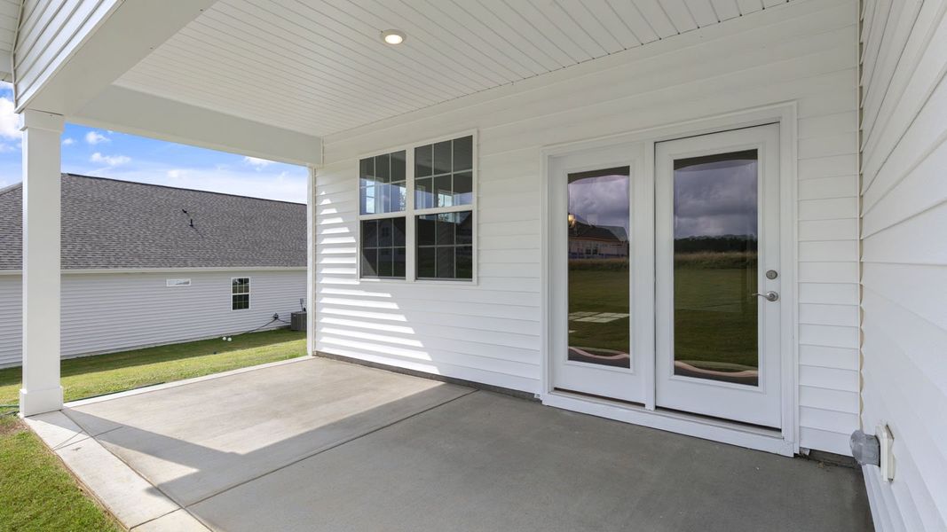 Exterior details and patio area of a home in The Villas at Martin Farms, Aberdeen (Image 4). Exterior details and patio area of a home in The Villas at Martin Farms, Aberdeen (Image 4).