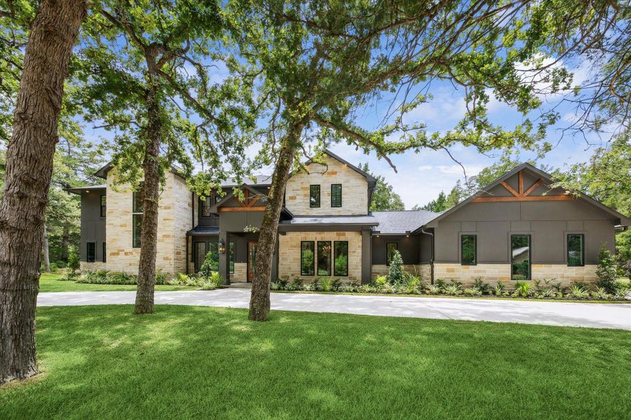 Front exterior of a new home in , New Ulm, TX, highlighting curb appeal (Image 26). Front exterior of a new home in , New Ulm, TX, highlighting curb appeal (Image 26).