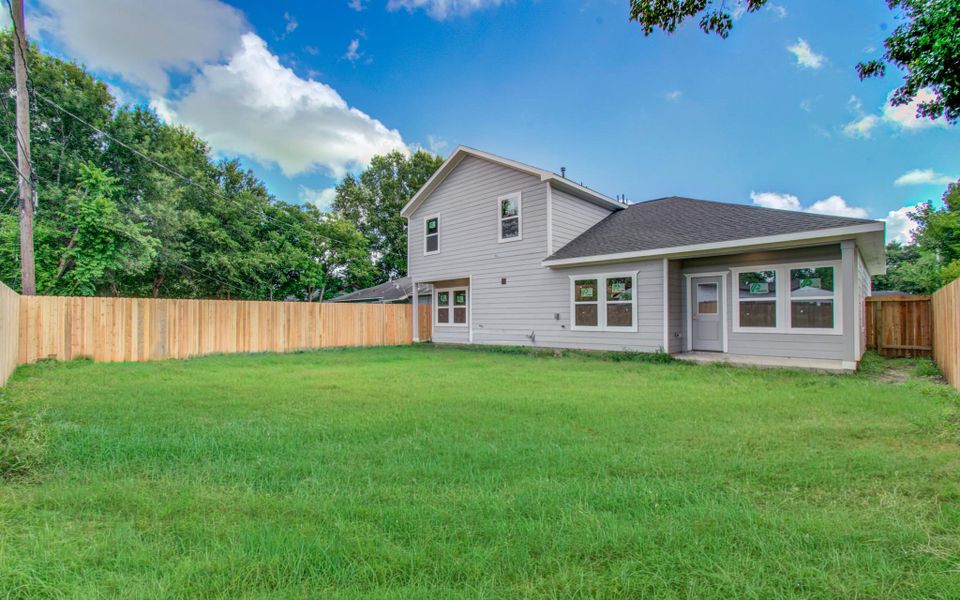 Exterior details and patio area of a home in , Houston (Image 3).