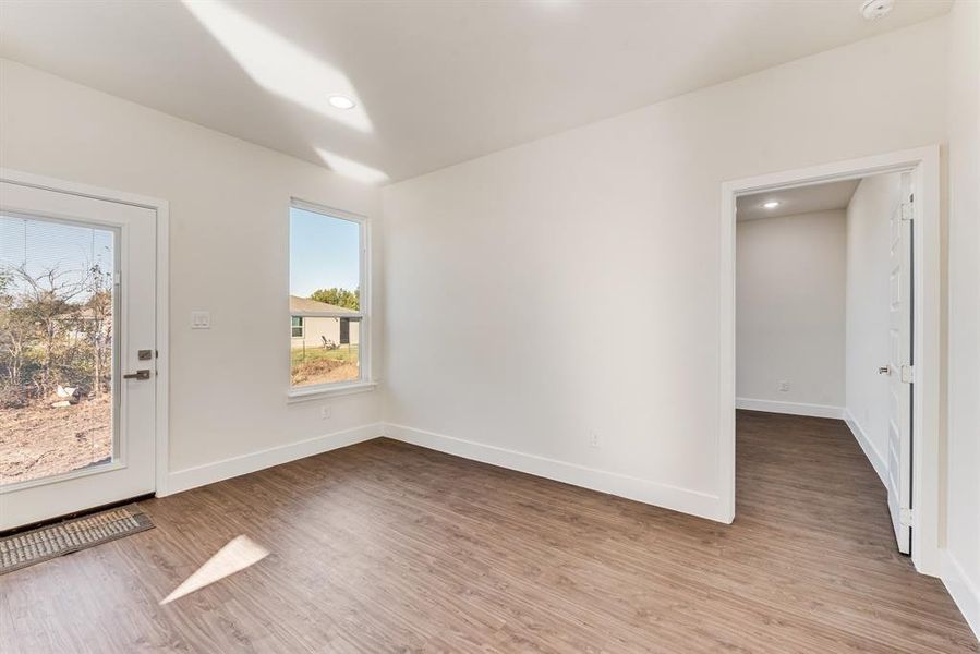 Spare room featuring light hardwood / wood-style floors